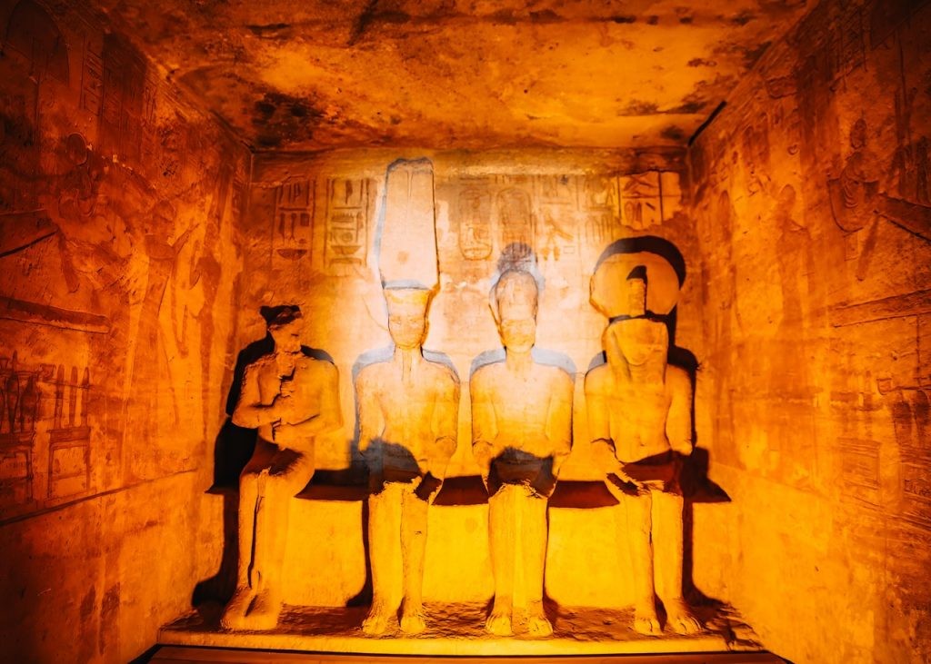 The illuminated statues inside the Temple of Ramesses II in Abu Simbel - Egypt