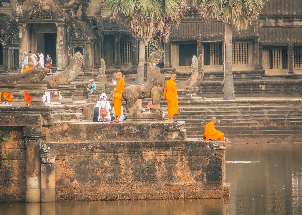 Monks waiting for sunset at Angkor Wat in Siem Reap - Cambodia
