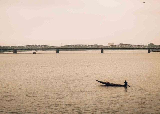 Fisherman on the Perfume River in Hue - Vietnam