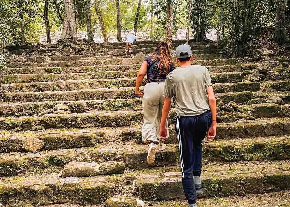 Climbing the Grand Acropolis at the Calakmul ruins in Mexico